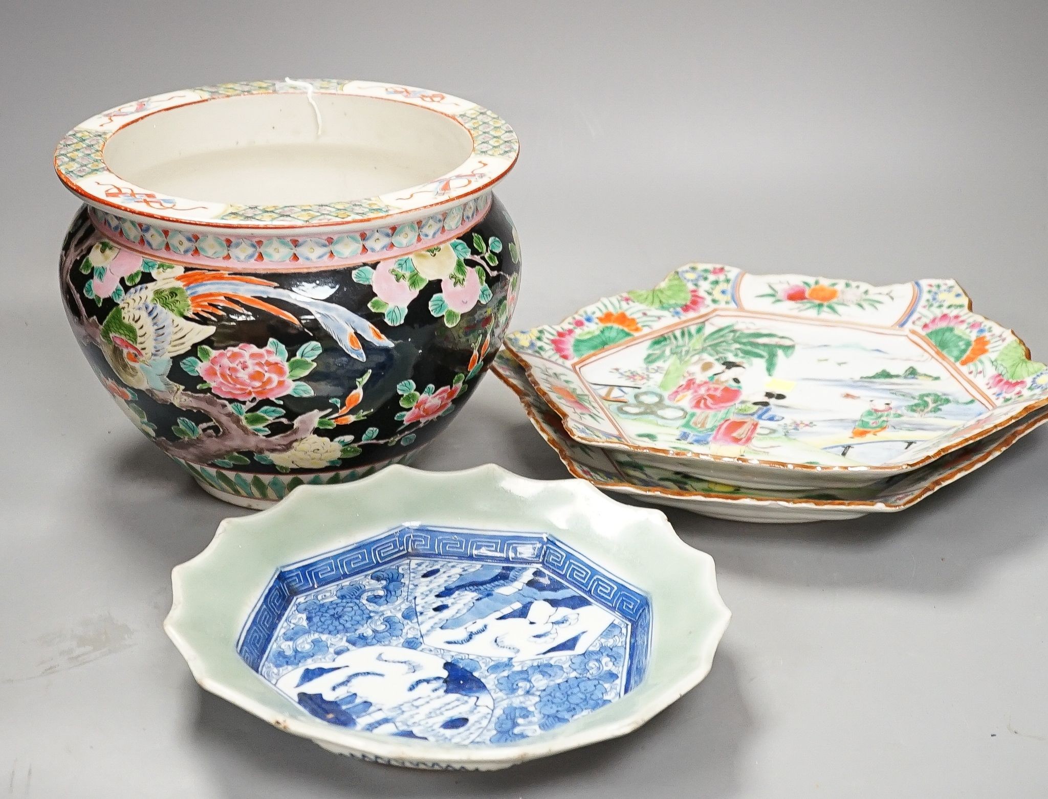 Three Japanese porcelain dishes and a jardiniere, 19 cms high.
